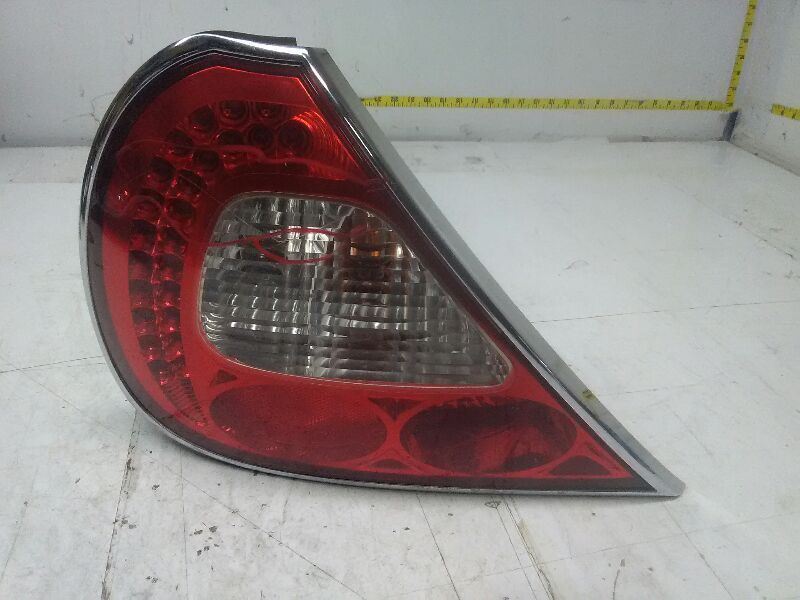 06-07 JAGUAR XJ8 Driver Left Tail Light Chrome Bezel AA 59750