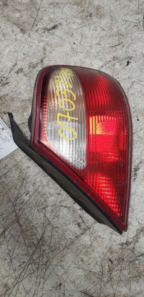 98-03 JAGUAR XJ8 Passenger Right Tail Light Painted Bezel AA 107192